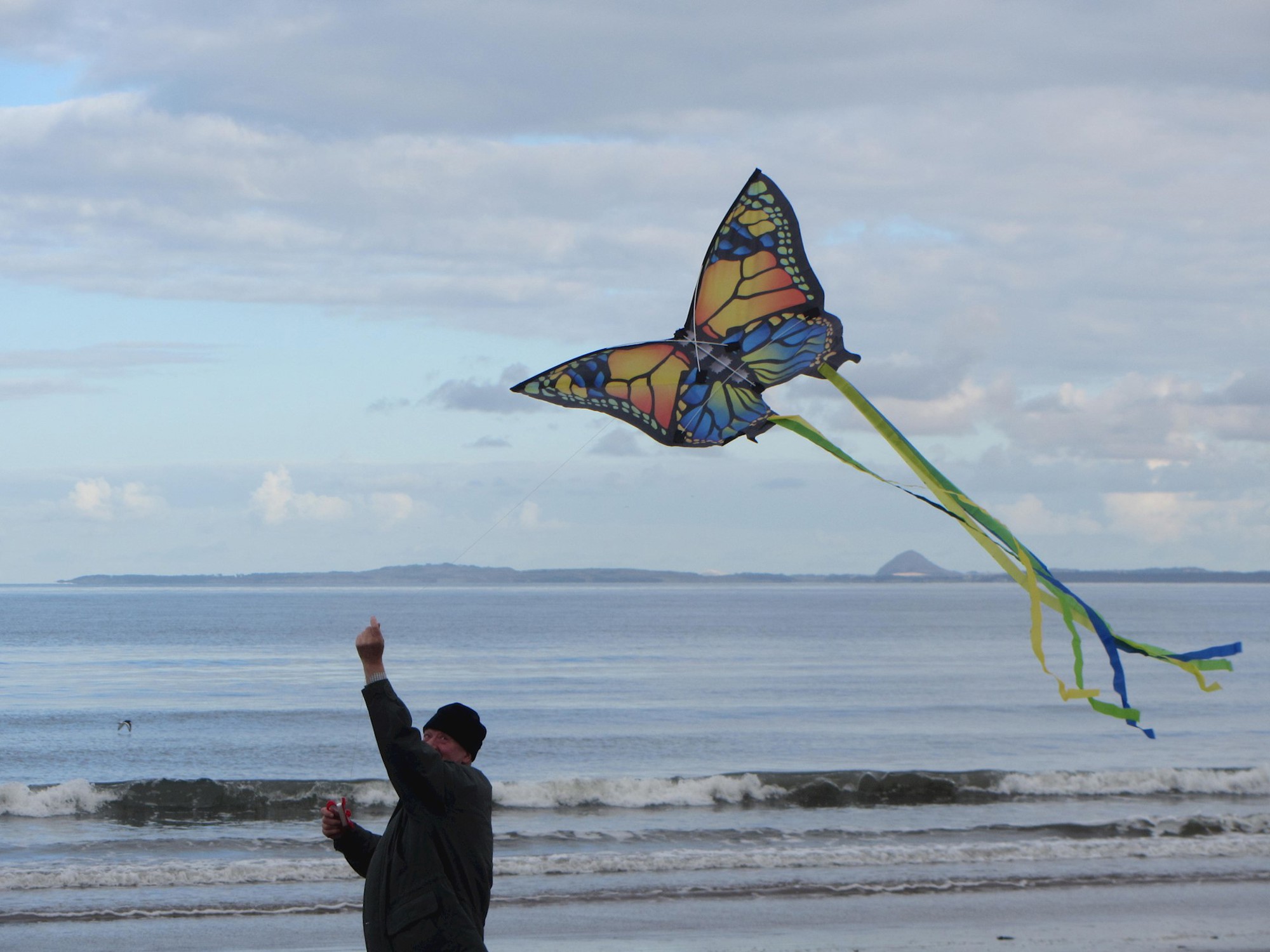 Man with kite on Portobello beach