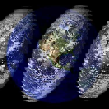 The Earth from space showing cloud over the seas and land